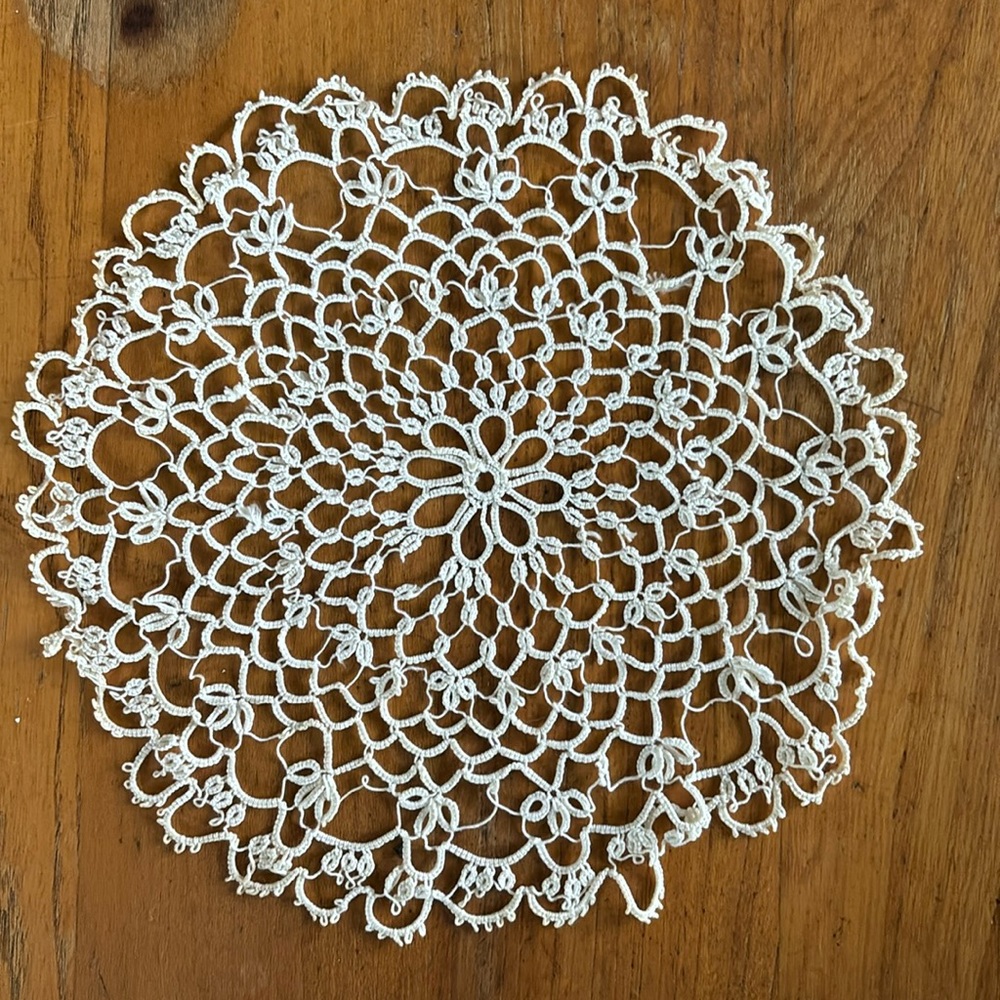 Vintage 9” round hand made tatted ecru doily